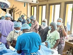 63 prisoners receive complimentary surgical procedures.